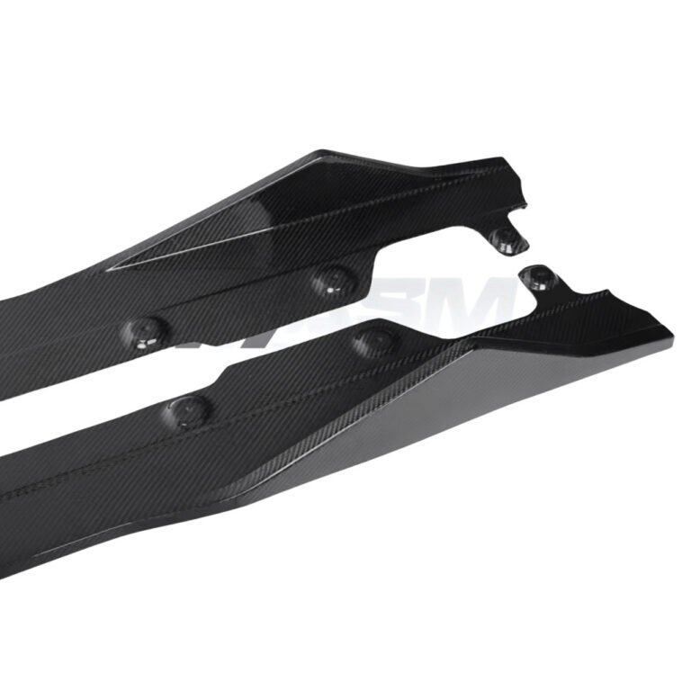 Close-up of BMW G42 2 Series carbon fibre side skirts gloss-finish rocker extensions for aerodynamic upgrade