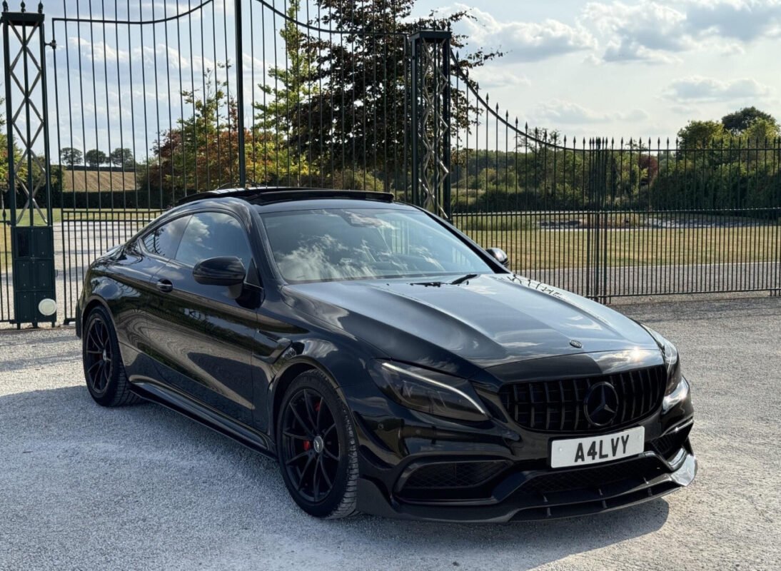 Installed carbon fibre front splitter lip on Mercedes C63 AMG W205 Coupe gloss-finish OEM fitment aero upgrade
