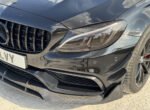Angle view of Mercedes C63 AMG W205 Coupe carbon fibre front splitter lip