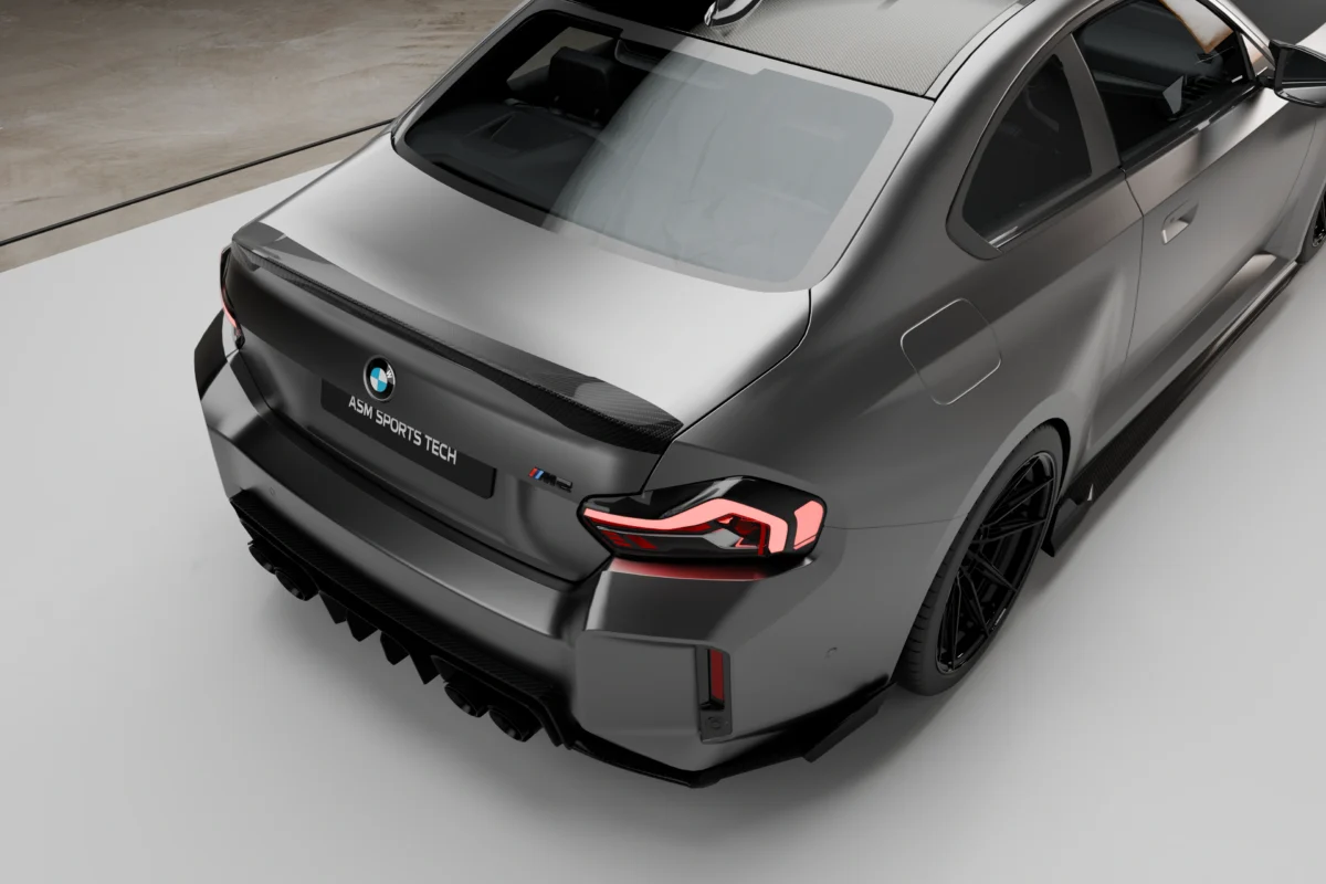 top view of a bmw g87 m2 in a showroom installed with a carbon fibre rear diffuser