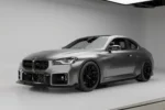 BMW G87 M2 with the full ASM Sports Tech pre-preg carbon fibre body kit, front three-quarter view