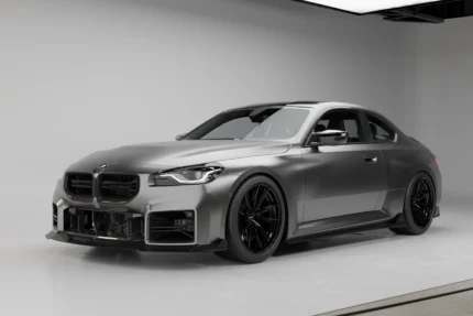 BMW G87 M2 with the full ASM Sports Tech pre-preg carbon fibre body kit, front three-quarter view