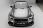 Front-on view of the BMW G87 M2 with ASM carbon front splitter fitted