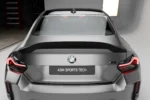 close-up view of a pre-preg carbon fibre rear spoiler ducktail for bmw g87 m2