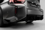 rear angle view of a bmw g87 m2 fitted with a carbon fibre body kit
