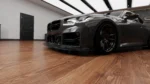 BMW G87 M2 dry carbon fibre front splitter shown as part of the ASM Sports Tech full aero body kit