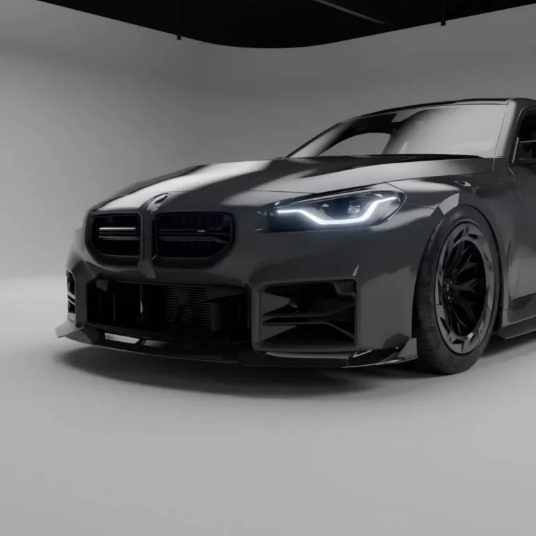 M2 front view in lit studio, showcasing carbon grille design