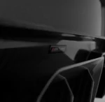 Macro view of ASM Tuning badge on the rear diffuser