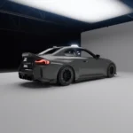 Left rear perspective showing ASM carbon side extensions on M2