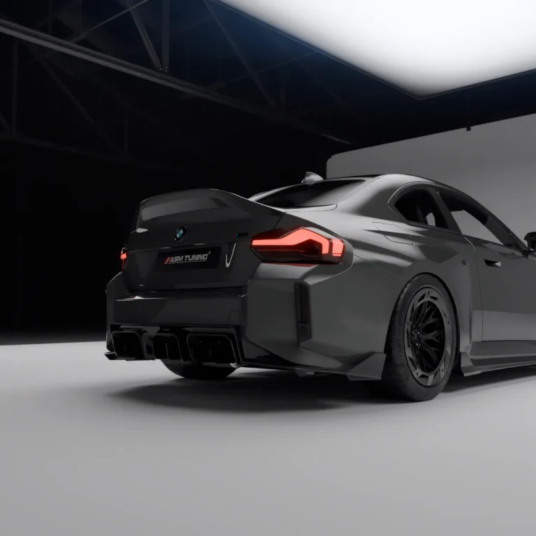 BMW G87 M2 rear side showing carbon ducktail spoiler