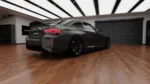 BMW G87 M2 dry carbon fibre lower valance fitment detail showing precise rear bumper alignment