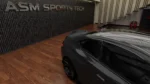 close-up of BMW G87 M2 pre-preg carbon fibre rear spoiler showing carbon weave detail and gloss finish