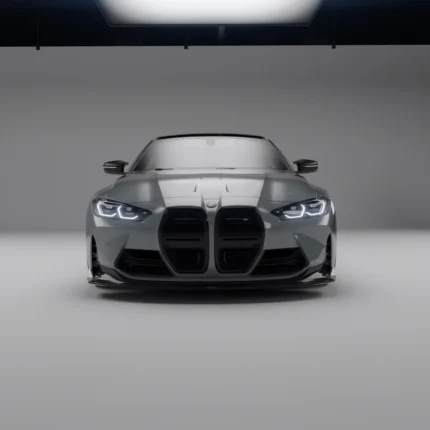 Studio front shot of grey BMW G82/G83 M4 showcasing ASM carbon fibre bumper ducts