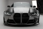 BMW G82 M4 dry carbon fibre front splitter shown as part of the ASM Sports Tech full aero body kit