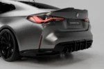 BMW G82 M4 full dry carbon fibre aero kit rear view showing ASM Sports Tech rear spoiler and carbon diffuser