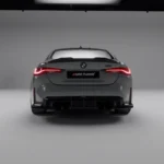 Straight rear view of BMW G82 M4 with quad exhausts and carbon diffuser