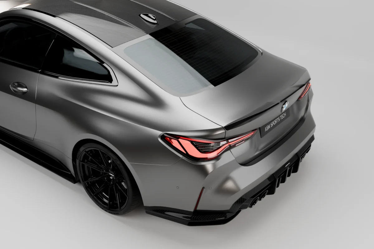 BMW M4 G82 and G22 carbon rear spoiler side profile showing OEM+ trunk lip integration