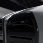 Close-up of BMW badge and ASM carbon grille on M4 G82/G83