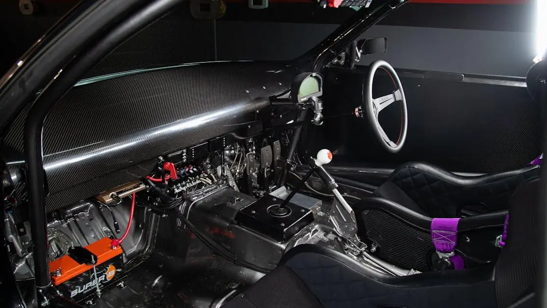 High-performance car interior with racing seats, illustrating "how to install a roll cage".