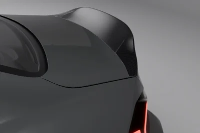 Close-Up Of Bmw G87 M2 Dry Carbon Fiber Rear Spoiler Installed On Trunk Lid, Designed For Aerodynamic Downforce And Oem+ Styling