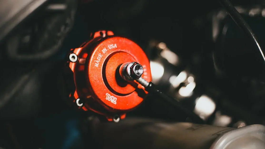 Red valve on car engine for how to install a blow off valve guide.