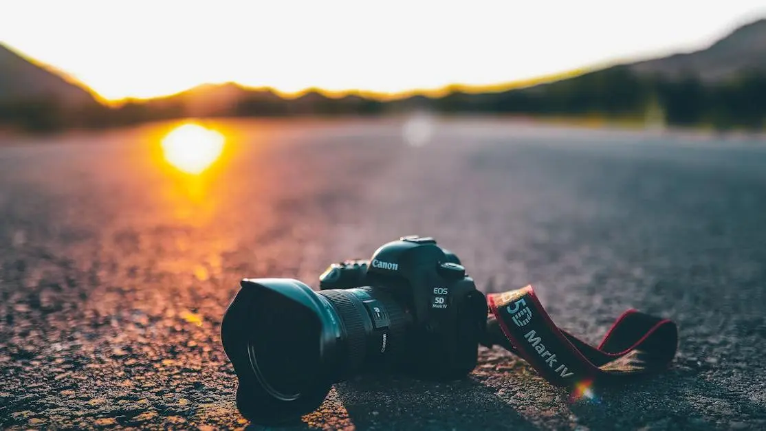 Car equipped with the best coilovers for daily driving on a road at sunrise.