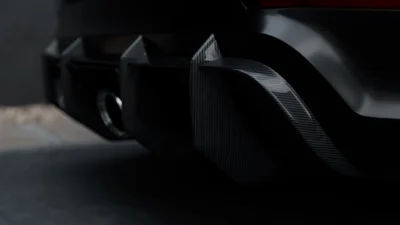 Fin-style carbon fibre rear diffuser blades on Porsche Cayenne Turbo GT Coupe