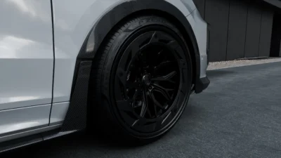 Close-up of forged wheel and carbon fibre arch detail on Porsche Cayenne Turbo GT