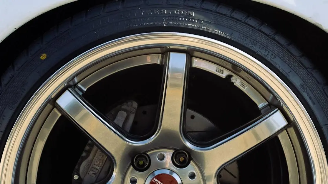 Close-up of after market car wheels on a modified car.