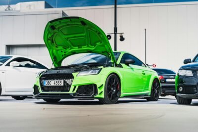 Top Carbon‑Fibre Aero Mods For Track‑Day Enthusiasts Audi Tt Rs With Carbon-Fibre Front Splitter And Bonnet Open, Highlighting Installation Access And Maintenance Area