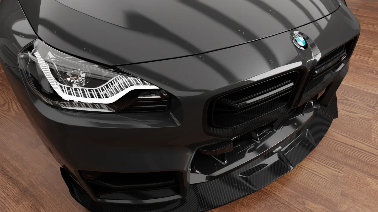 BMW G87 M2 carbon fibre front bumper intake grilles showing sharper front-end detail and dry carbon finish