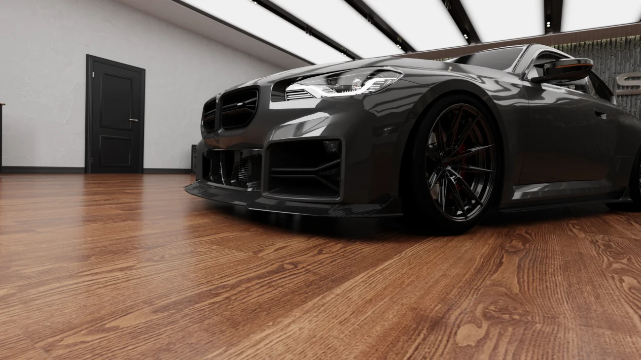 BMW G87 M2 dry carbon fibre front splitter fitment detail showing precise lower bumper alignment