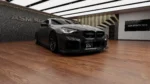 BMW G87 M2 dry carbon front grille fitment detail showing precise OEM+ bumper alignment and carbon fibre finish