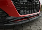 Close-up of the ASM pre-preg carbon front splitter fitted to the Audi RS7 C8