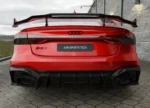 Audi RS7 C8 fitted with the complete ASM Sports Tech carbon fibre body kit in studio lighting